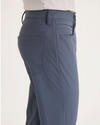 Side view of model wearing Ombre Blue Go Pant, Slim Fit with Airweave.