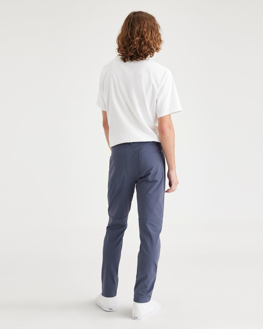 Back view of model wearing Ombre Blue Jean Cut Go, Slim Tapered Fit with Airweave.