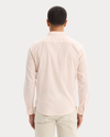 Back view of model wearing Peach Blush Ultimate Shirt, Regular Fit.