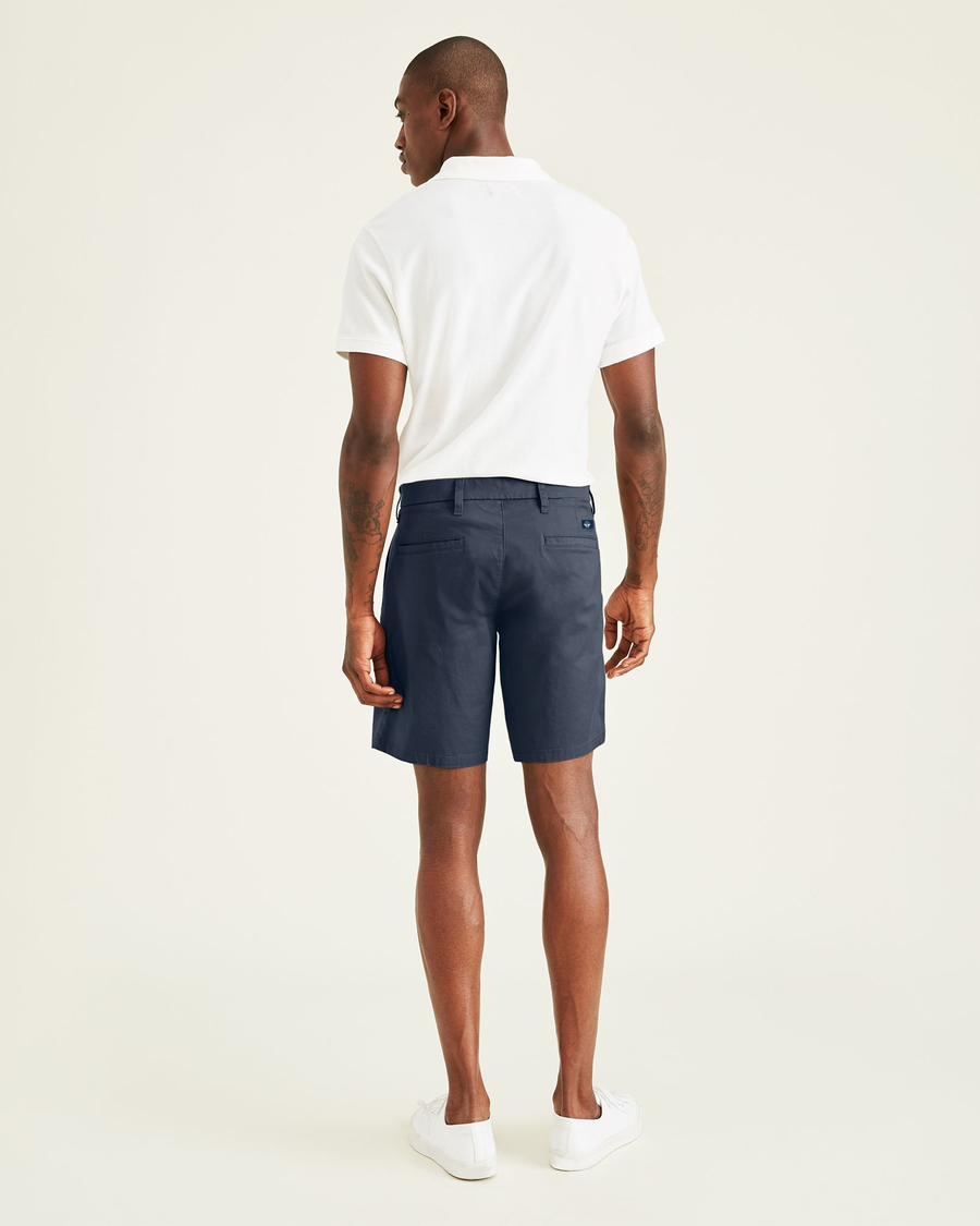 Back view of model wearing Pembroke Men's Straight Fit Ultimate Shorts.