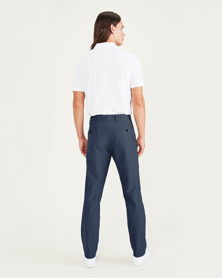Back view of model wearing Pembroke Smart 360 Flex Comfort Knit Chino Pants, Slim Fit.