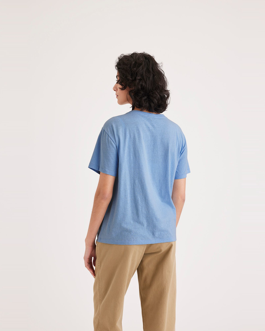 Back view of model wearing Placid Blue Women's Deep V-Neck Tee Shirt.