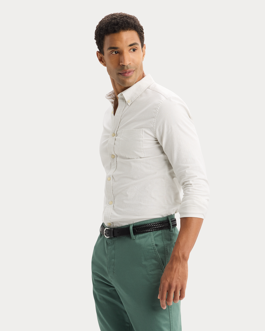 View of model wearing Playoff Tea 2 Button Collar Shirt, Slim Fit.