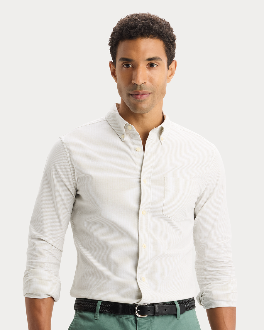 View of model wearing Playoff Tea 2 Button Collar Shirt, Slim Fit.