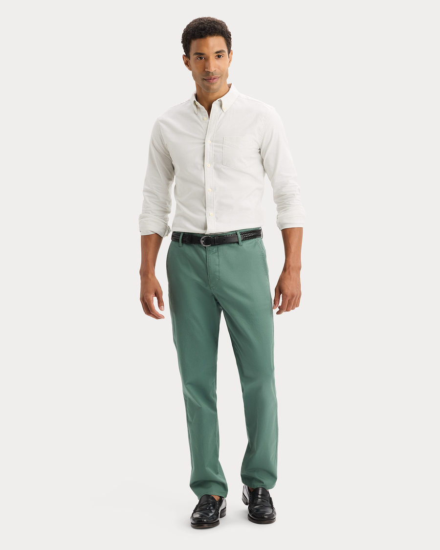 View of model wearing Playoff Tea 2 Button Collar Shirt, Slim Fit.