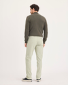 Back view of model wearing Pure Cashmere Alpha Chino Pants, Slim Fit.