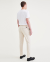 Back view of model wearing Sahara Khaki Alpha Chino Pants, Slim Fit.