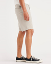 Side view of model wearing Sahara Khaki Alpha Chino Shorts, Straight Fit.