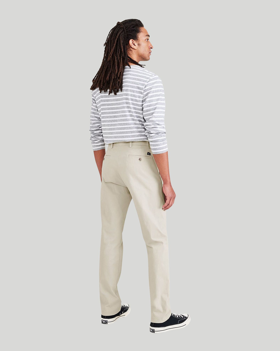 Back view of model wearing Sahara Khaki Men's Slim Fit Smart 360 Flex Alpha Chino Pants.