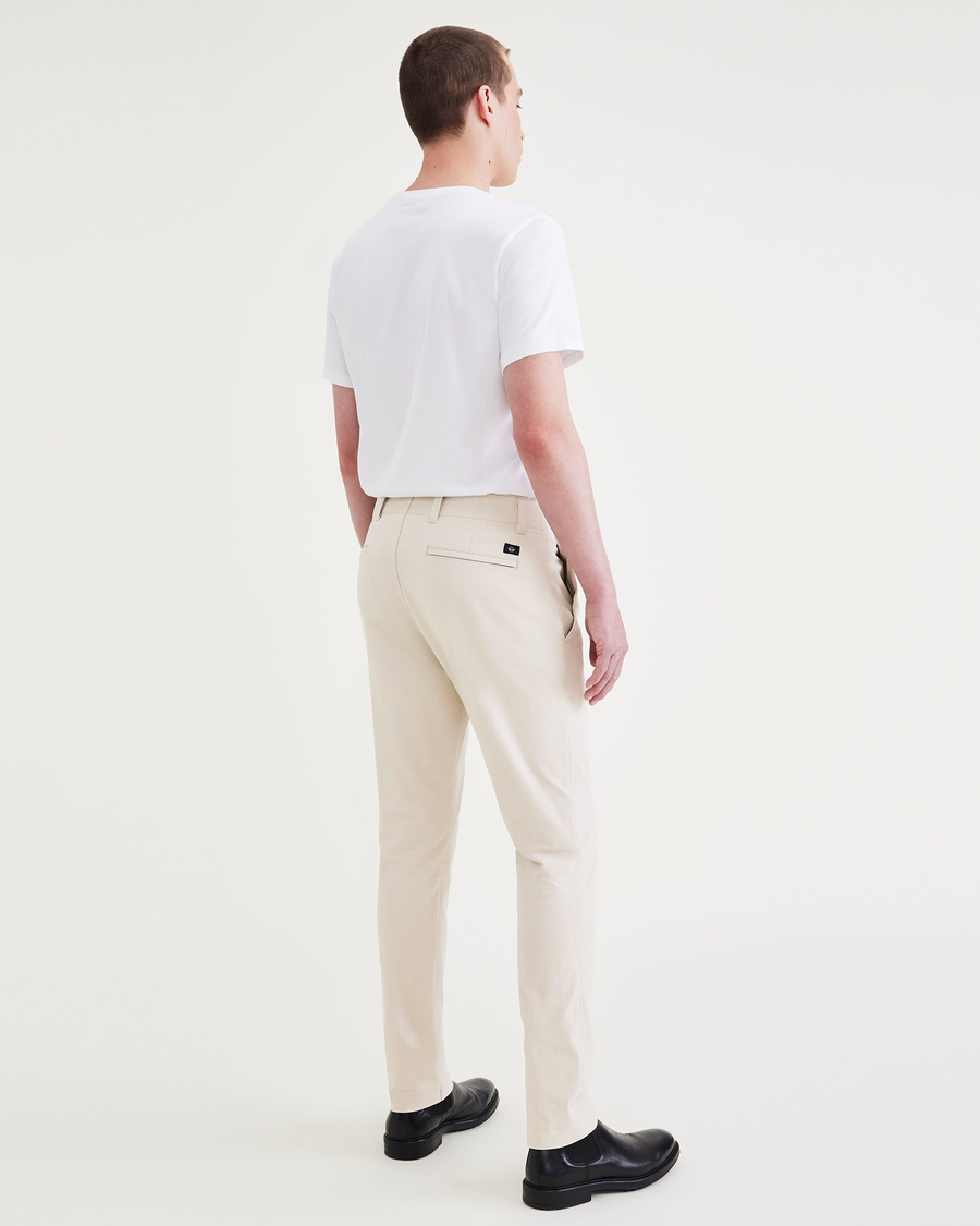 Back view of model wearing Sahara Khaki Men's Slim Fit Smart 360 Flex California Chino Pants.