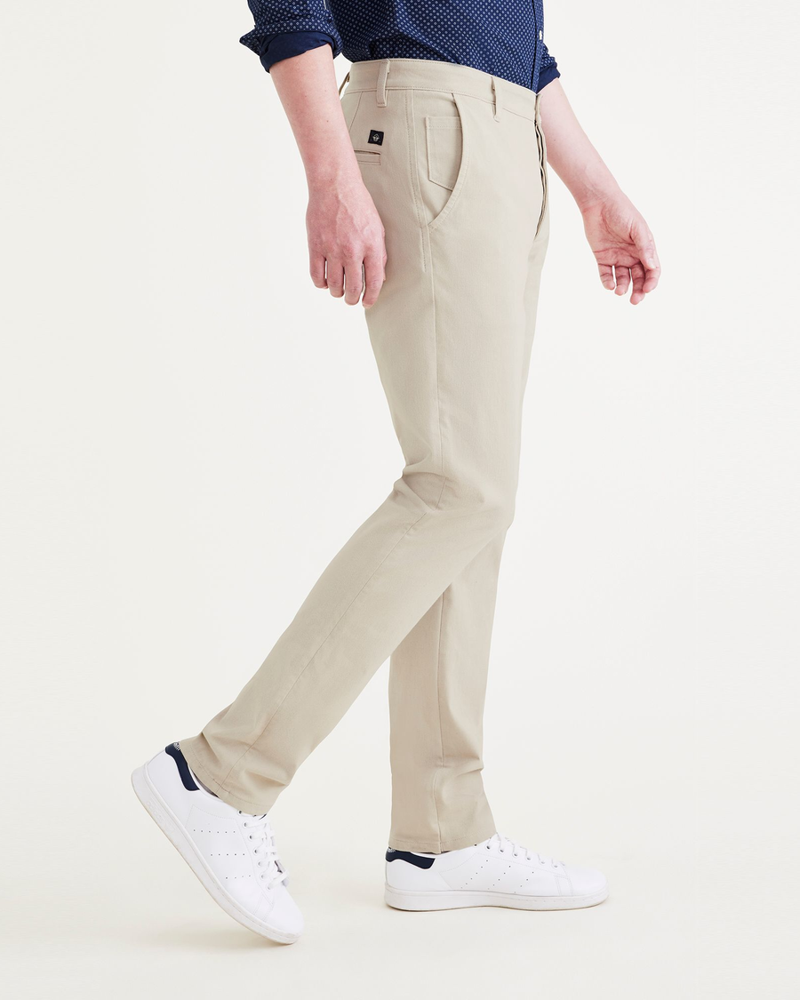 Side view of model wearing Sahara Khaki Men's Slim Fit Supreme Flex Alpha Khaki Pants.