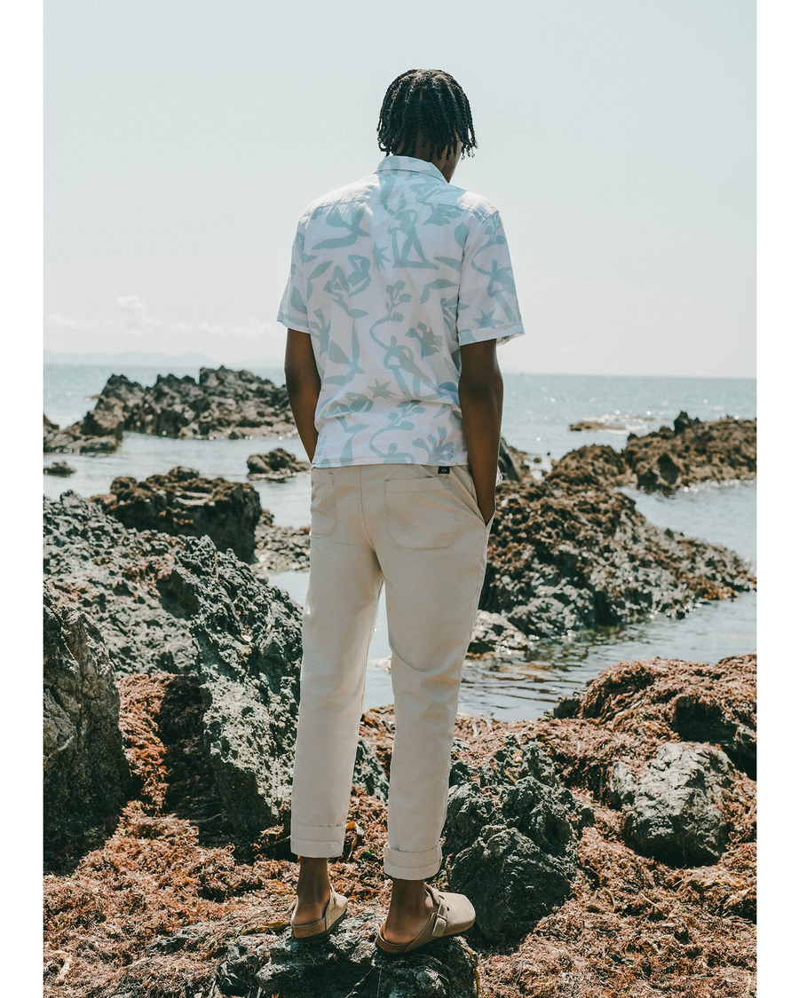 Back view of model wearing Sahara Khaki Men's Straight Tapered Fit California Pull-On Pants.