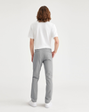 Back view of model wearing Sharkskin Alpha Chino Pants, Skinny Fit.