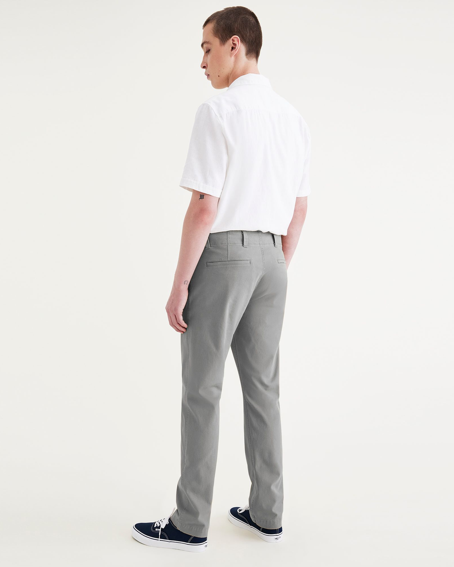 Back view of model wearing Sharkskin Alpha Chino Pants, Slim Fit.