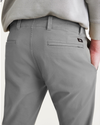 View of model wearing Sharkskin Men's Skinny Fit Smart 360 Flex California Chino Pants.