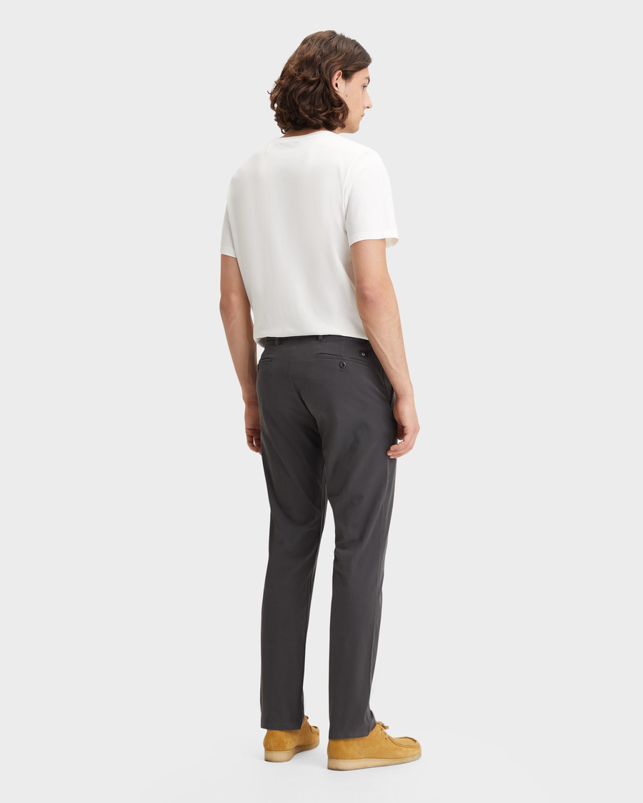 Back view of model wearing Steelhead Crafted Khaki Pants, Slim Fit.