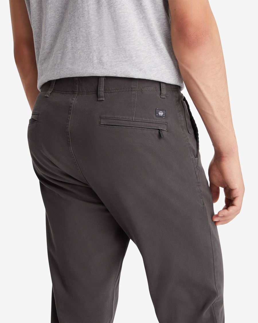 View of model wearing Steelhead Men's Slim Fit Smart 360 Flex Alpha Khaki Pants.