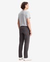 Back view of model wearing Steelhead Men's Slim Fit Smart 360 Flex Alpha Khaki Pants.