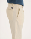 Side view of model wearing Summer Earth Men's Skinny Fit Smart 360 Flex California Chino Pants.