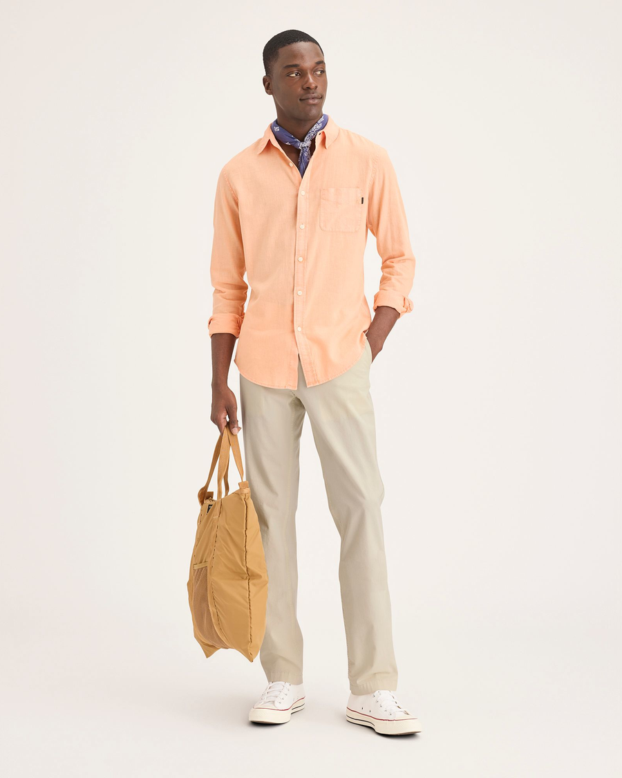 Front view of model wearing Summer Earth Men's Slim Fit Smart 360 Flex California Chino Pants.