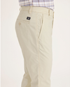 Side view of model wearing Summer Earth Men's Smart 360 Flex Ultimate Chino.