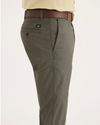 Side view of model wearing Tea Leaf Men's Slim Fit Original Chino Pants.