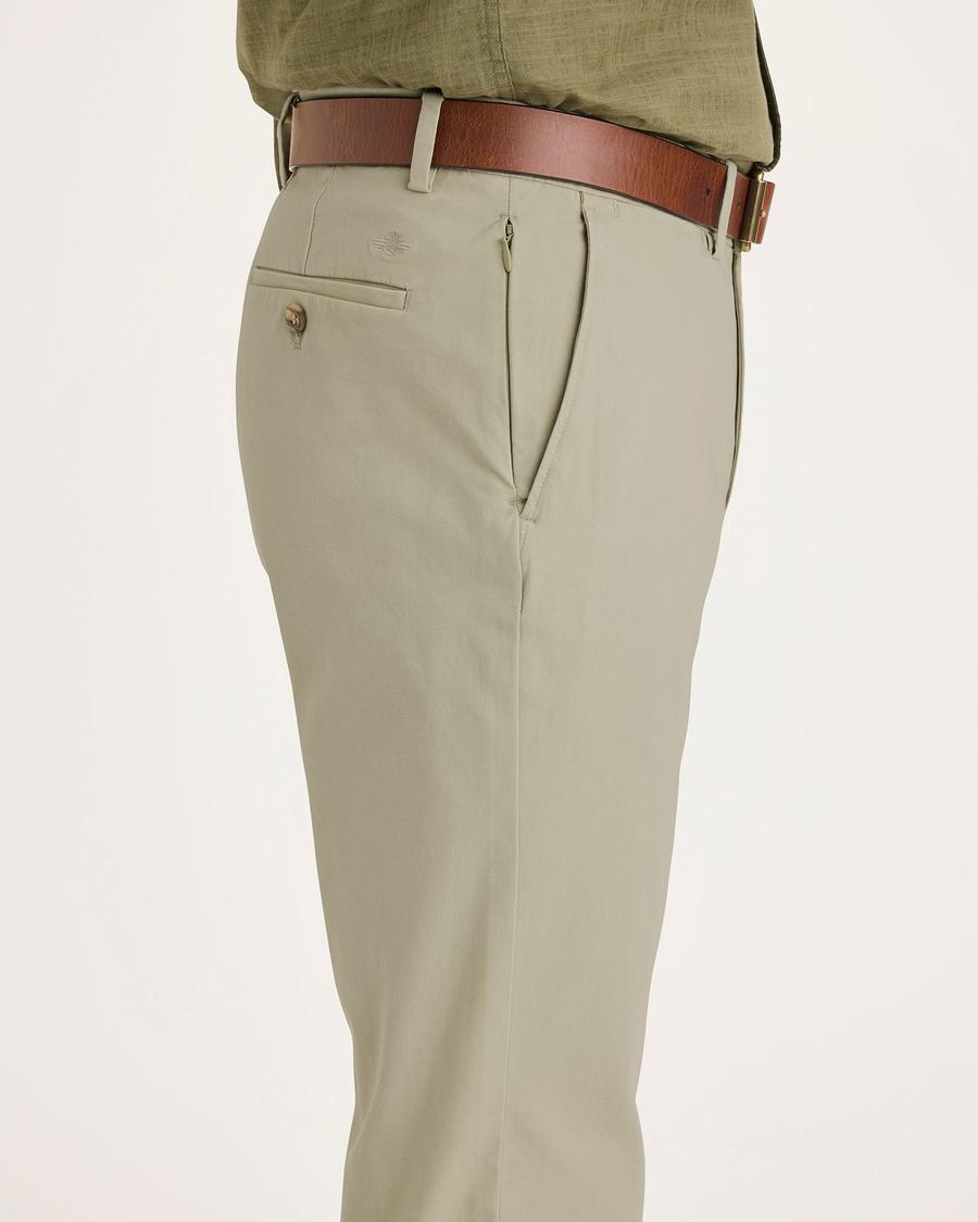 Side view of model wearing Tidal Foam Crafted Khaki Pants, Slim Fit.