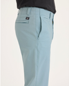 Side view of model wearing Tourmaline Men's Slim Fit Smart 360 Flex California Chino Pants.