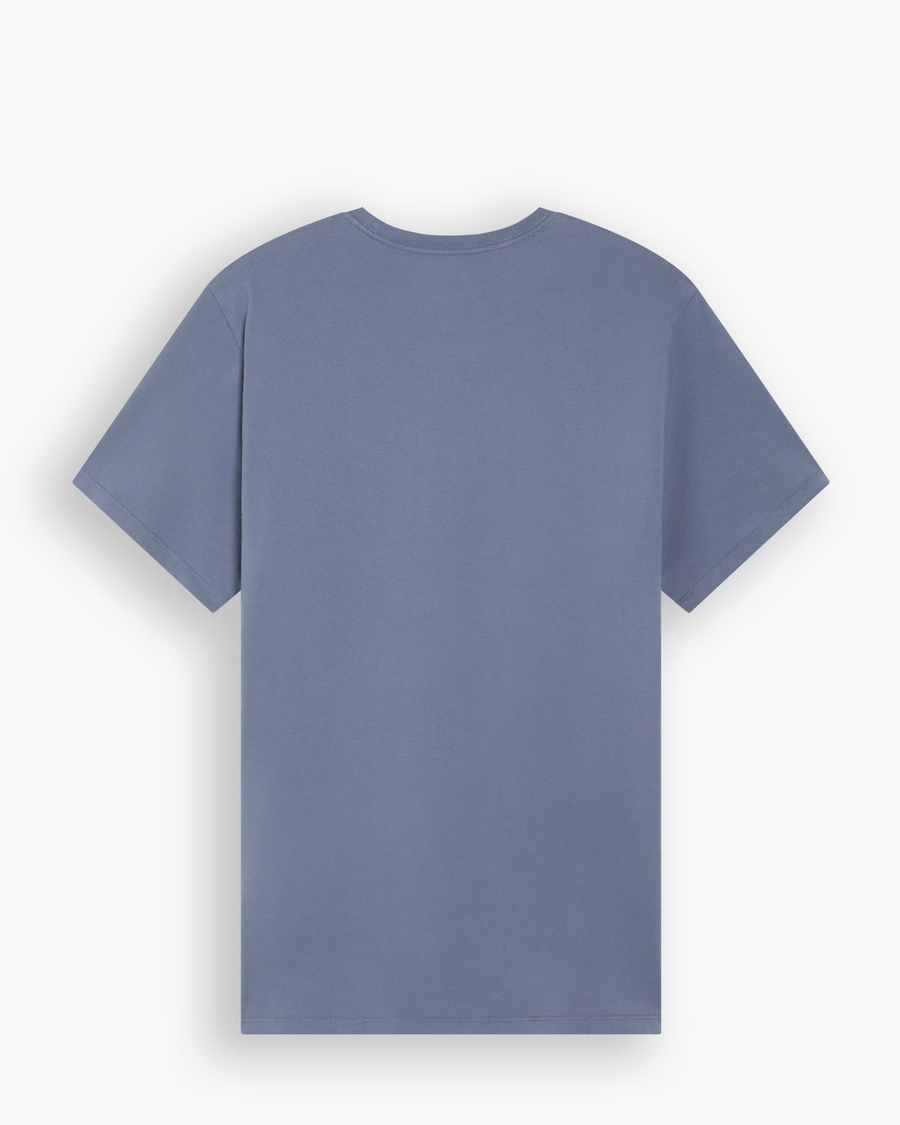 View of model wearing Varsity Emblem Graphic Tee, Slim Fit.