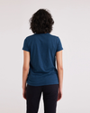 Back view of model wearing Victoria Blue Women's Slim Fit Graphic Tee Shirt.