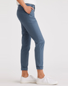 Side view of model wearing Vintage Indigo Women's Slim Fit Weekend Chino Pants.