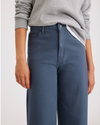 View of model wearing Vintage Indigo Women's Straight Fit High Jean Cut Pants.