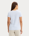 Back view of model wearing Vista Blue Favorite Tee, Slim Fit.